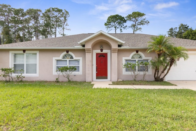 ranch-style house featuring a garage, roof with shingles, a front yard, and stucco siding