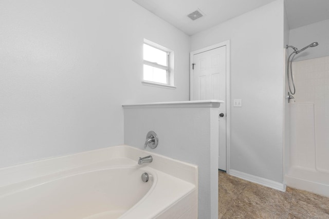 full bathroom with a shower, visible vents, and a bath