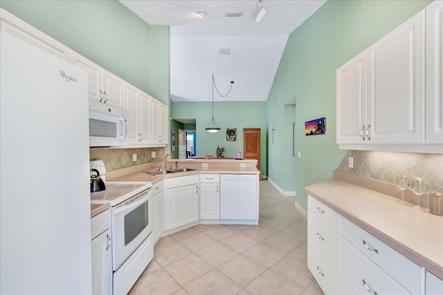 kitchen featuring sink, pendant lighting, a textured ceiling, white appliances, and white cabinets