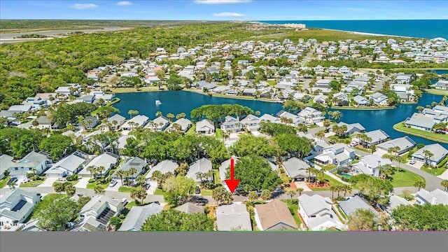 bird's eye view with a water view