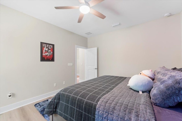 633 W Pope Rd, Saint Augustine, FL 32080 - bedroom with wood finished floors and ceiling fan