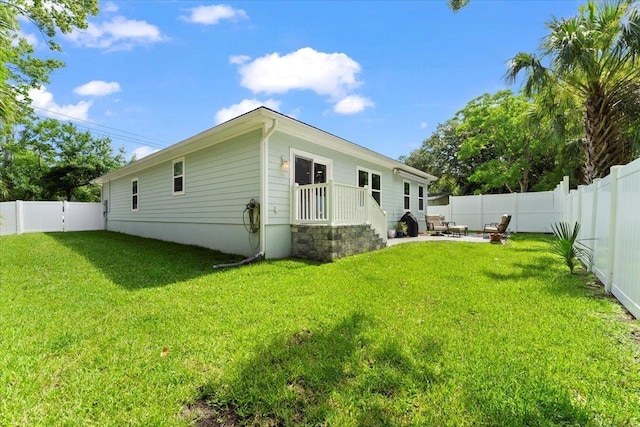 633 W Pope Rd, Saint Augustine, FL 32080 - rear view of property featuring a fenced backyard and a patio