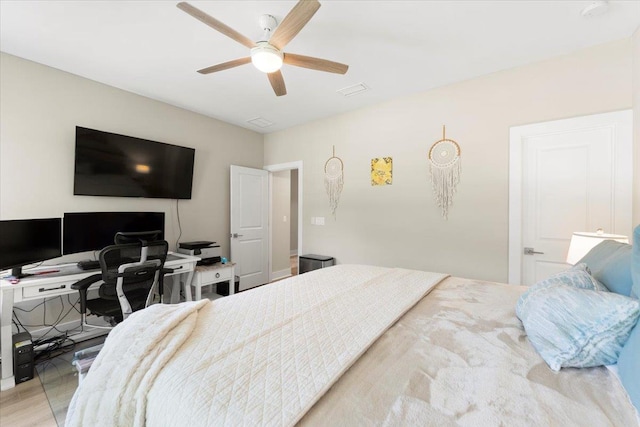 633 W Pope Rd, Saint Augustine, FL 32080 - bedroom featuring an office area, ceiling fan, and wood finished floors