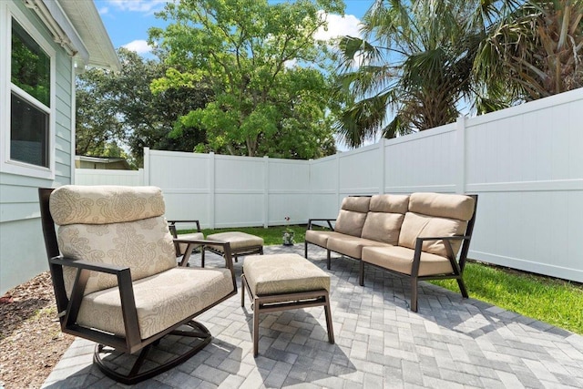 633 W Pope Rd, Saint Augustine, FL 32080 - fenced backyard featuring a patio and an outdoor hangout area