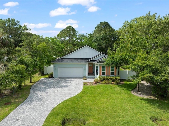 633 W Pope Rd, Saint Augustine, FL 32080 - ranch-style home with decorative driveway and a garage