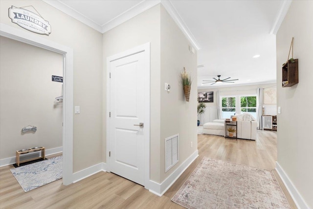 633 W Pope Rd, Saint Augustine, FL 32080 - corridor featuring light wood-type flooring and crown molding