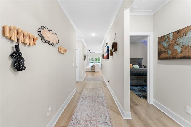 633 W Pope Rd, Saint Augustine, FL 32080 - hall with ornamental molding and light wood finished floors
