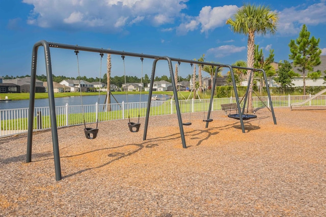 view of play area with a water view