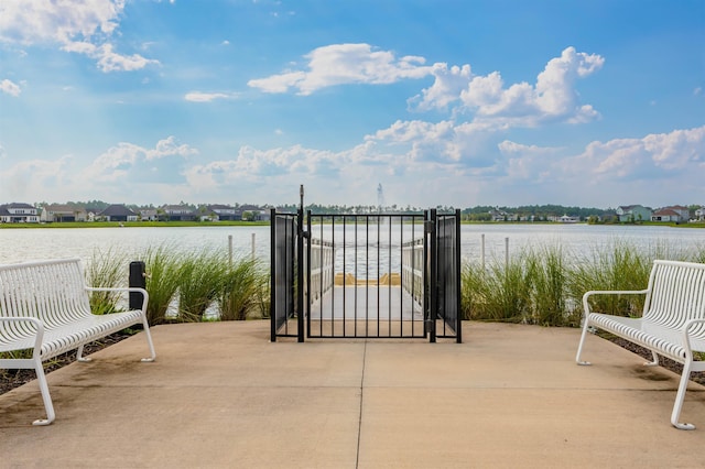 view of patio featuring a water view