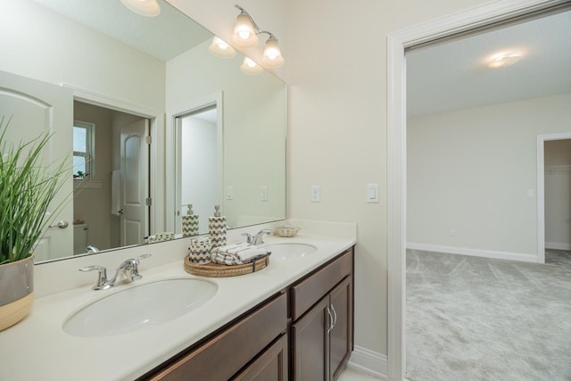 bathroom featuring vanity and a textured ceiling