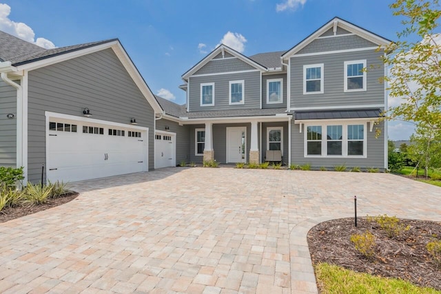 craftsman house featuring a garage