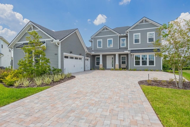 craftsman-style home with a garage