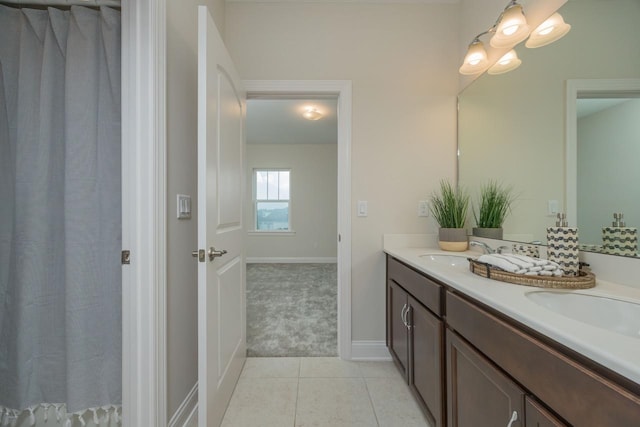 bathroom with vanity and tile patterned floors