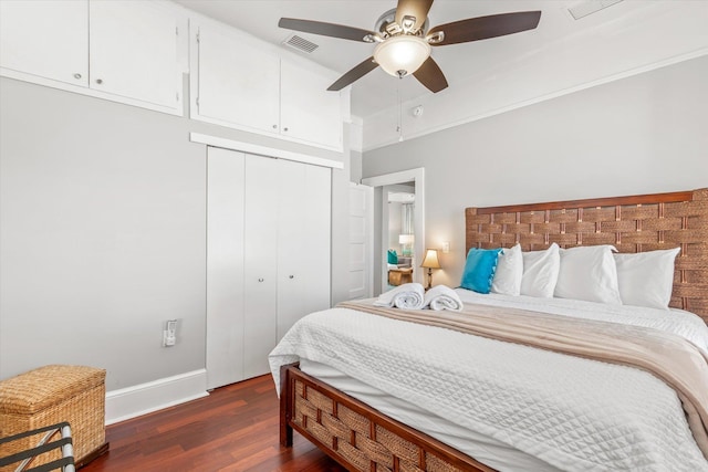 54 Grove Ave, Saint Augustine, FL 32084 - bedroom featuring dark wood-style floors, baseboards, a closet, and ceiling fan