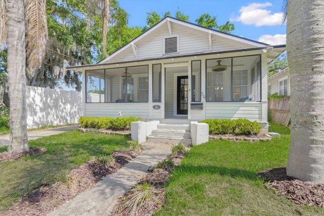 54 Grove Ave, Saint Augustine, FL 32084 - view of front of property featuring a sunroom