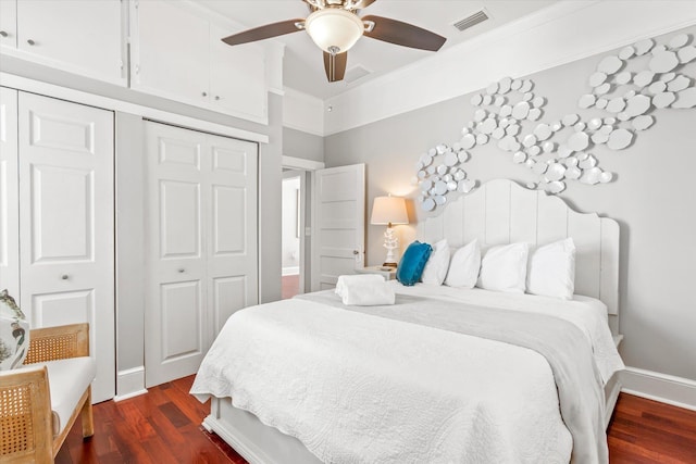 54 Grove Ave, Saint Augustine, FL 32084 - bedroom featuring dark wood finished floors, a closet, ceiling fan, ornamental molding, and baseboards