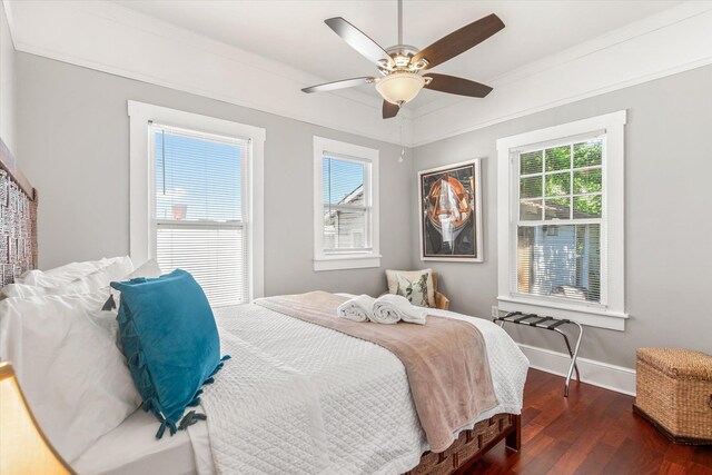 54 Grove Ave, Saint Augustine, FL 32084 - bedroom featuring wood finished floors, baseboards, ceiling fan, and ornamental molding