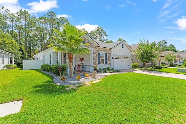 313 Aventurine Ave, Saint Augustine, FL 32086 - view of front of property with concrete driveway, stone siding, a garage, and stucco siding
