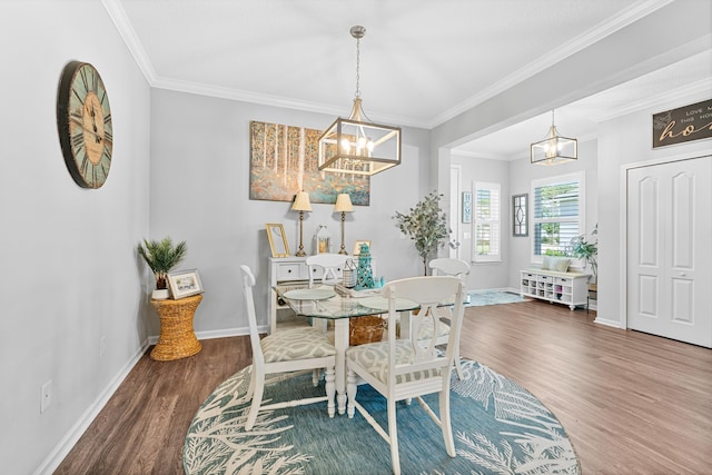 313 Aventurine Ave, Saint Augustine, FL 32086 - dining room with a chandelier, wood finished floors, and ornamental molding