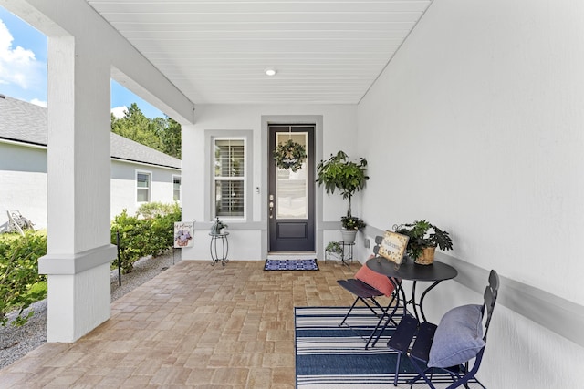 313 Aventurine Ave, Saint Augustine, FL 32086 - property entrance with stucco siding and a patio area