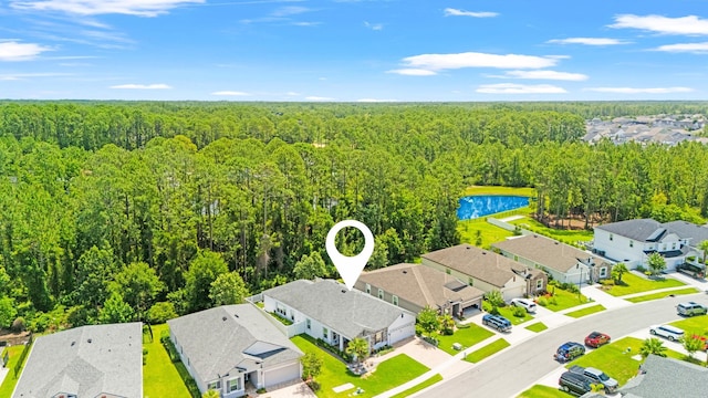 313 Aventurine Ave, Saint Augustine, FL 32086 - aerial perspective of suburban area with a forest and a nearby body of water