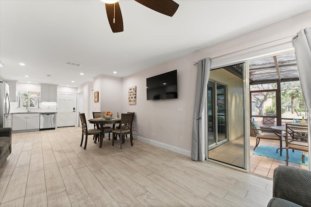 dining space featuring recessed lighting, visible vents, baseboards, and light wood-style flooring