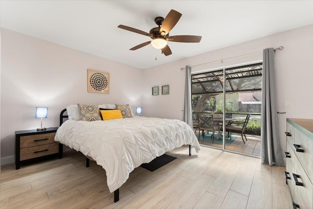 bedroom with access to exterior, light wood finished floors, and a ceiling fan