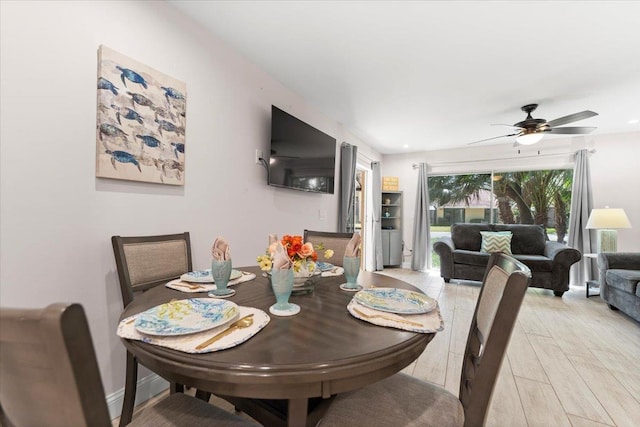 dining area featuring recessed lighting, baseboards, light wood-type flooring, and a ceiling fan