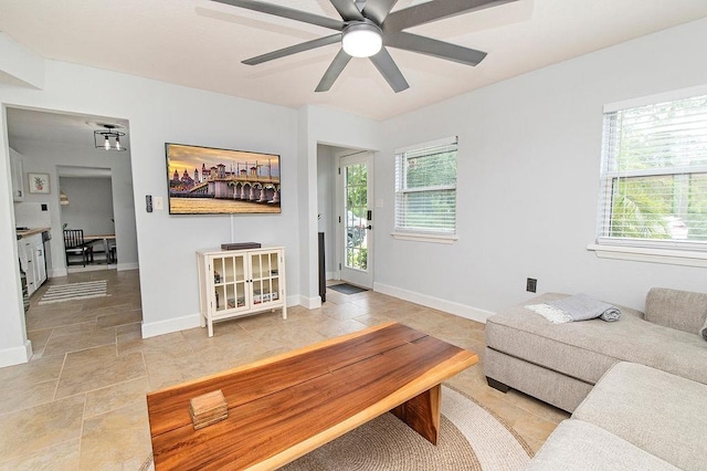 living room featuring ceiling fan