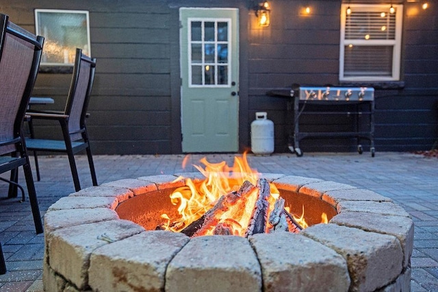 view of patio / terrace featuring a fire pit