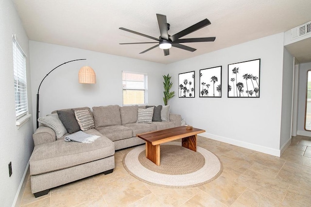 living room with ceiling fan