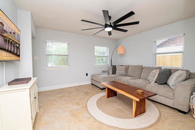 living room with ceiling fan