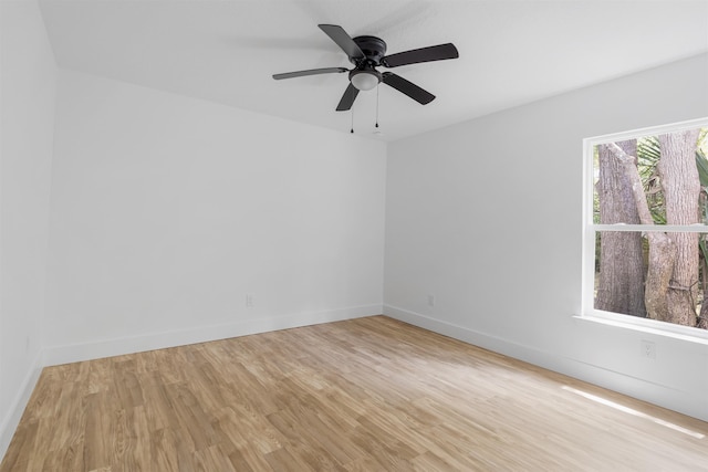 unfurnished room featuring ceiling fan and light hardwood / wood-style flooring