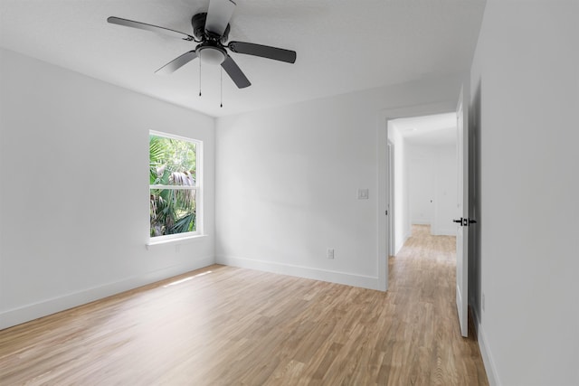 unfurnished room with light hardwood / wood-style floors and ceiling fan