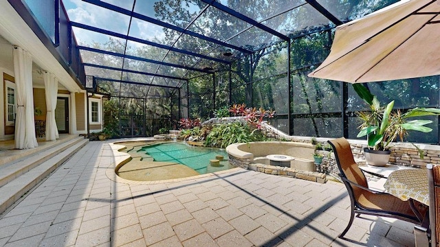 view of patio / terrace featuring a lanai