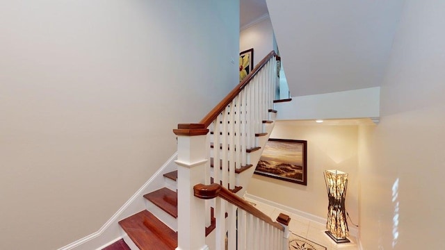 stairs with tile patterned flooring