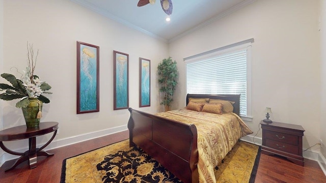 bedroom featuring ceiling fan, crown molding, and dark hardwood / wood-style floors