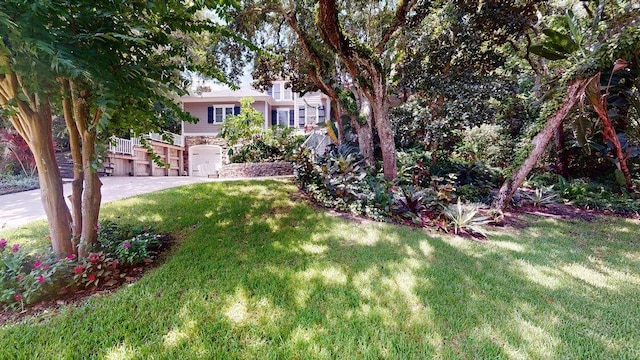 view of yard with a garage