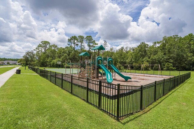 view of playground featuring a lawn