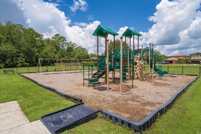 view of playground featuring a yard