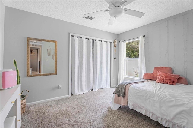 775 E Red House Branch Rd, Saint Augustine, FL 32084 - bedroom featuring carpet flooring, a textured ceiling, baseboards, and ceiling fan