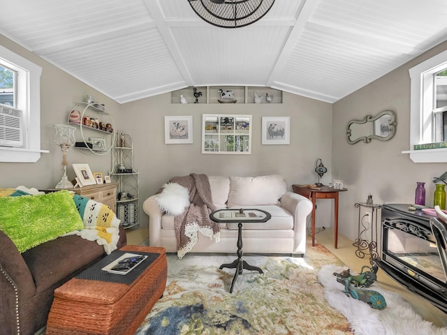 carpeted living room with lofted ceiling