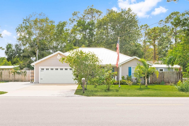 ranch-style house with driveway and a garage