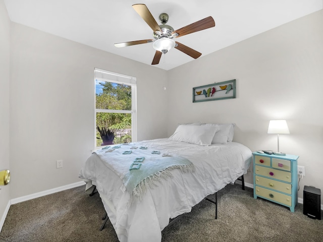 carpeted bedroom with baseboards and ceiling fan