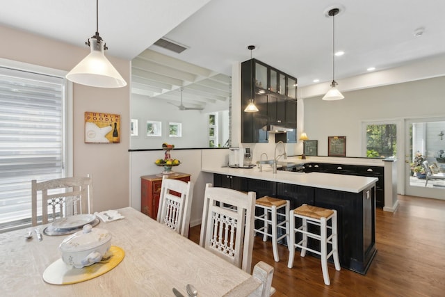 136 Island Hammock Way, Saint Augustine, FL 32080 - dining room featuring wood finished floors, a ceiling fan, recessed lighting, and beamed ceiling