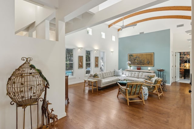 136 Island Hammock Way, Saint Augustine, FL 32080 - living area with high vaulted ceiling, wood finished floors, baseboards, and beam ceiling