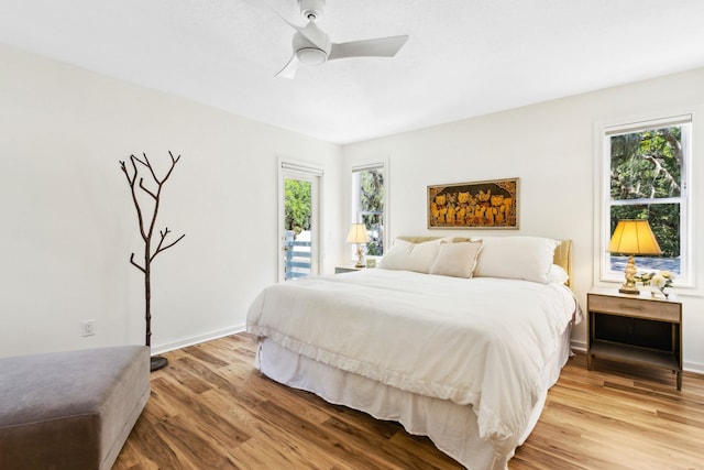 136 Island Hammock Way, Saint Augustine, FL 32080 - bedroom featuring multiple windows, light wood-type flooring, and ceiling fan