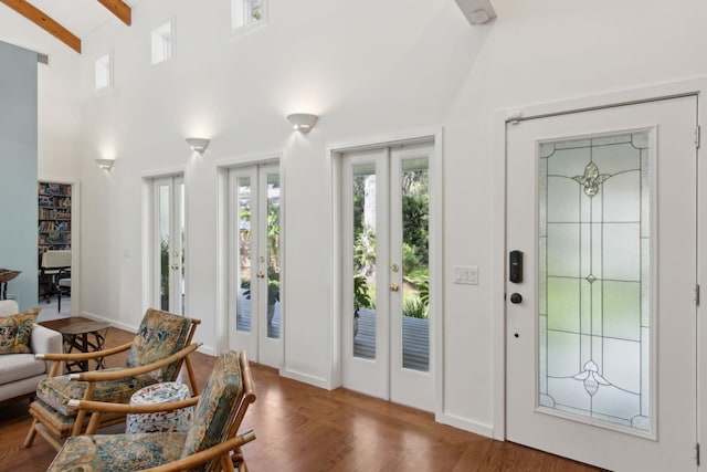 136 Island Hammock Way, Saint Augustine, FL 32080 - foyer entrance with beam ceiling, wood finished floors, french doors, and high vaulted ceiling