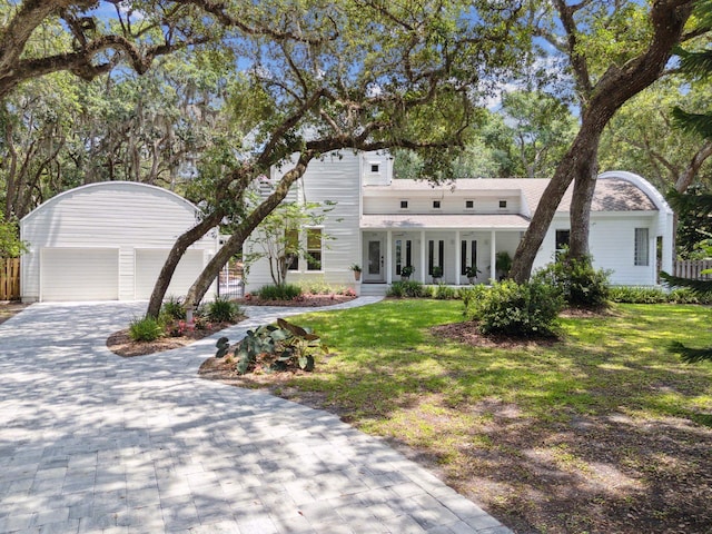 136 Island Hammock Way, Saint Augustine, FL 32080 - view of front of house featuring a front lawn and driveway