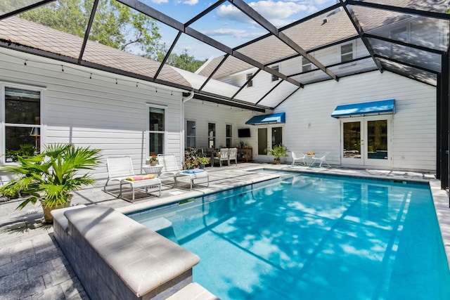 136 Island Hammock Way, Saint Augustine, FL 32080 - swimming pool with french doors, a patio, a lanai, and outdoor dining space